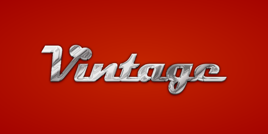 The word "vintage" printed in classic car chrome style.